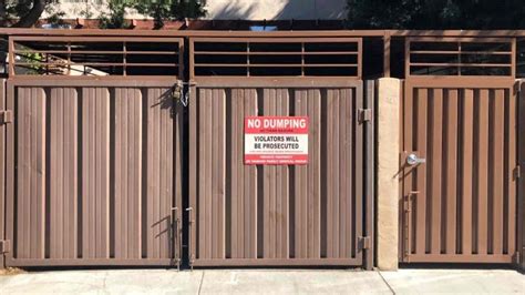 trash enclosrue doors with metal panels fabrication details|metal deck trash enclosures.